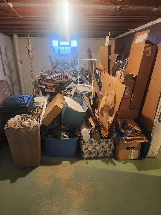 Roll-off dumpster container at job site for 2 Yard Dumpster Rental in Leon Valley